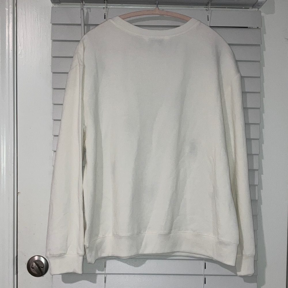 Elegant Cream V-Neck Sweater with Floral Accents - Picture 9 of 9